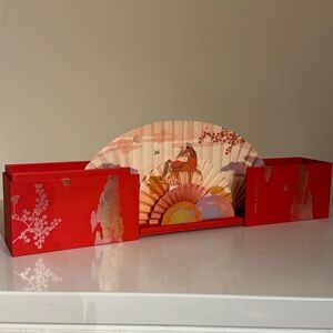 Van Cleef & Arpels red evenlope